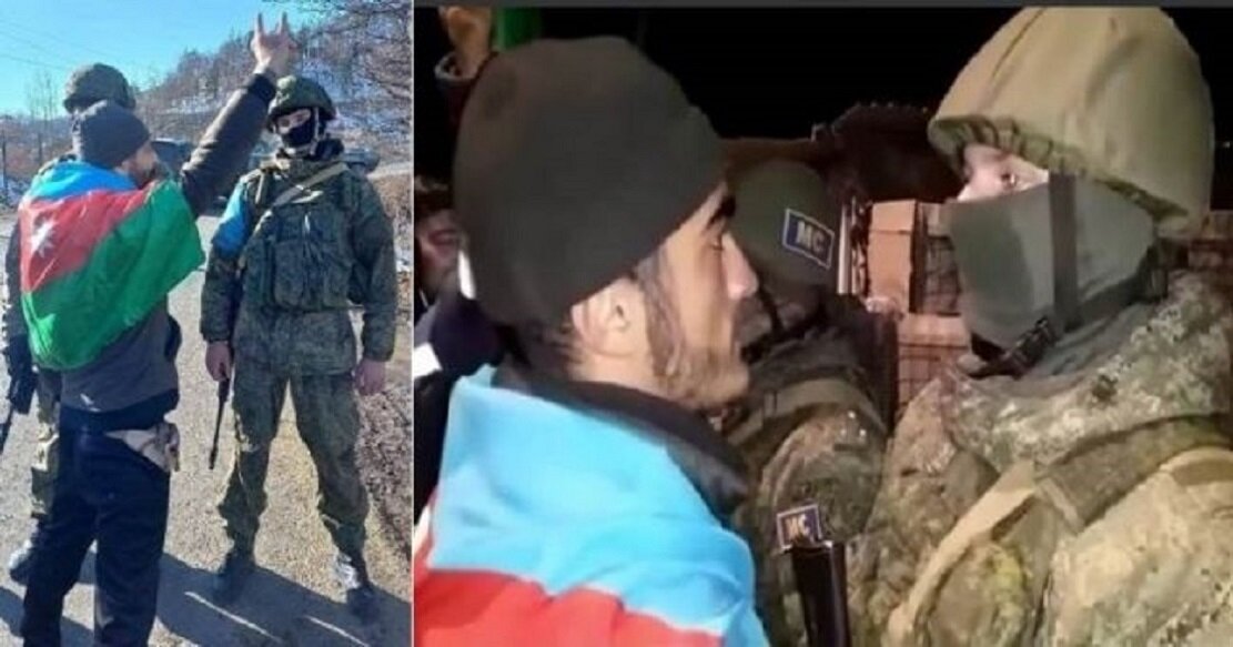 Азербайджанские "экологи"-провокаторы оскорбляли личное достоинство российских миротворцев, при этом постоянно размахивали перед ними флагами Украины. На фото "герой-эколог" показывает жест турецких "Серых волков"