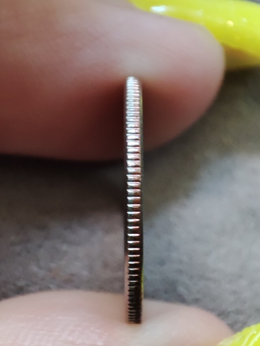 Самая тонкая монета.