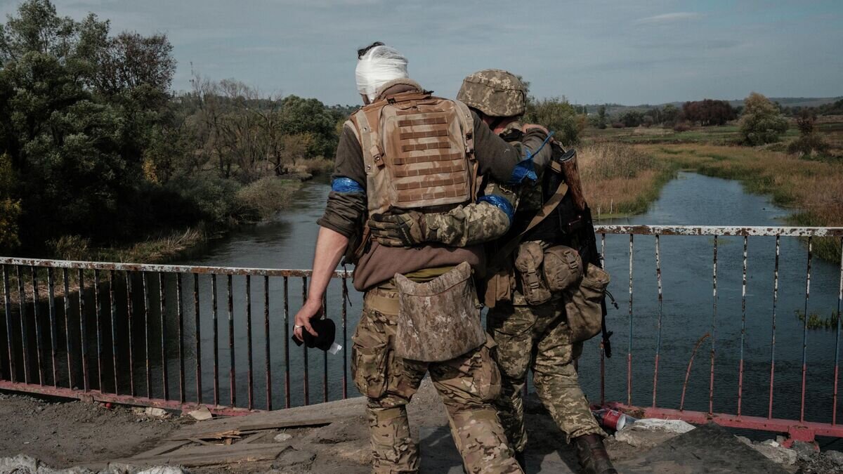    Раненый украинский военнослужащий© AFP 2022 / Yasuyoshi Chiba