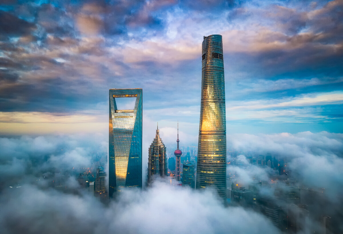 Shanghai centre. Финансовый центр Шанхай. Шанхайский Всемирный финансовый центр Китай. Башня Шанхай - мировой финансовый центр. Шанхай ТОВЕР небоскреб.