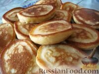 Очень вкусные и нежные оладьи на кефире. Настоятельно рекомендую пышные кефирные оладьи на завтрак.Продукты (на 4 порции)Кефир - 1 стакан (250 мл)Яйца - 1-2 шт.Мука пшеничная - 1,5 стакана (около 240 г)Сахар - 2-3 ст. ложкиСоль - 0,5 ч. ложкиСода - 0,25 ч. ложкиМасло растительное - для жарки  