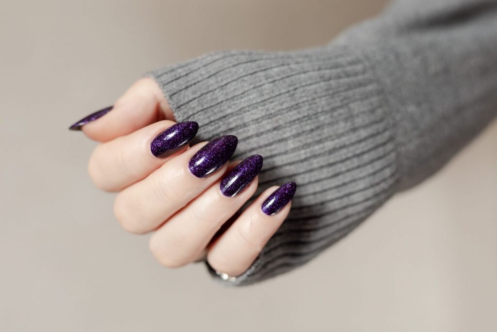 [caption id="attachment_977" align="alignnone" width="1024"] Glitter Purple Nails[/caption]