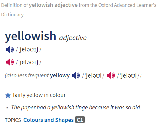 Cкриншот из словаря OALD.  "Желтоватый" - yellowish или yellowy. Уровень - C1 (advanced). 