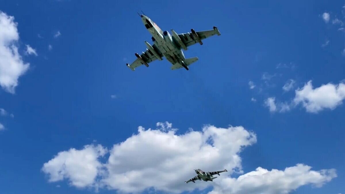    Штурмовики Су-25 ВКС России во время нанесения удара по позициям ВСУ© РИА Новости / Министерство обороны РФ