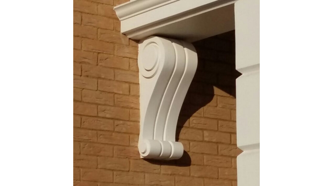 Поддерживающий и декоративный кронштейн