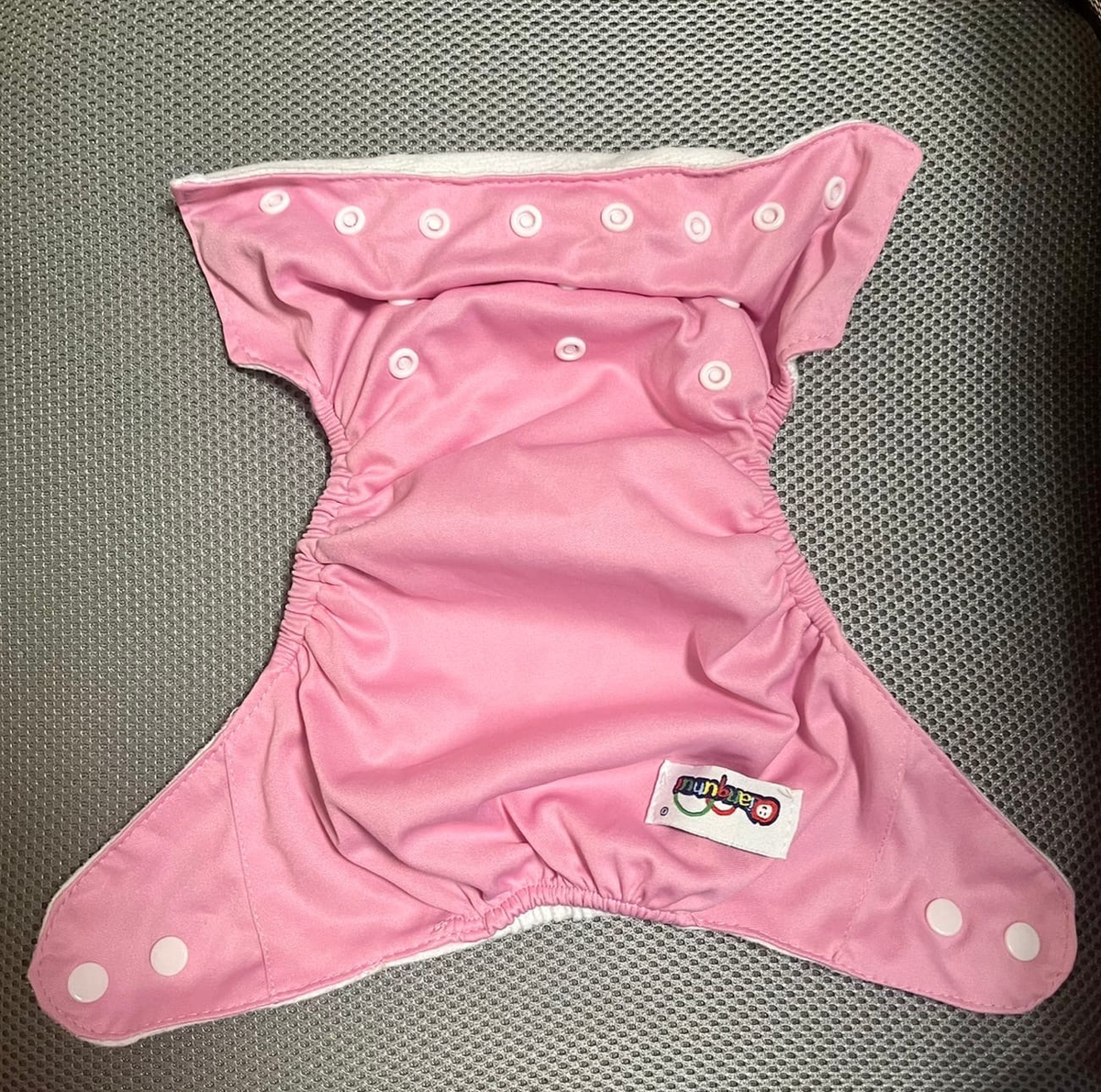 Внешняя сторона. Есть кнопки для регулирования размера.