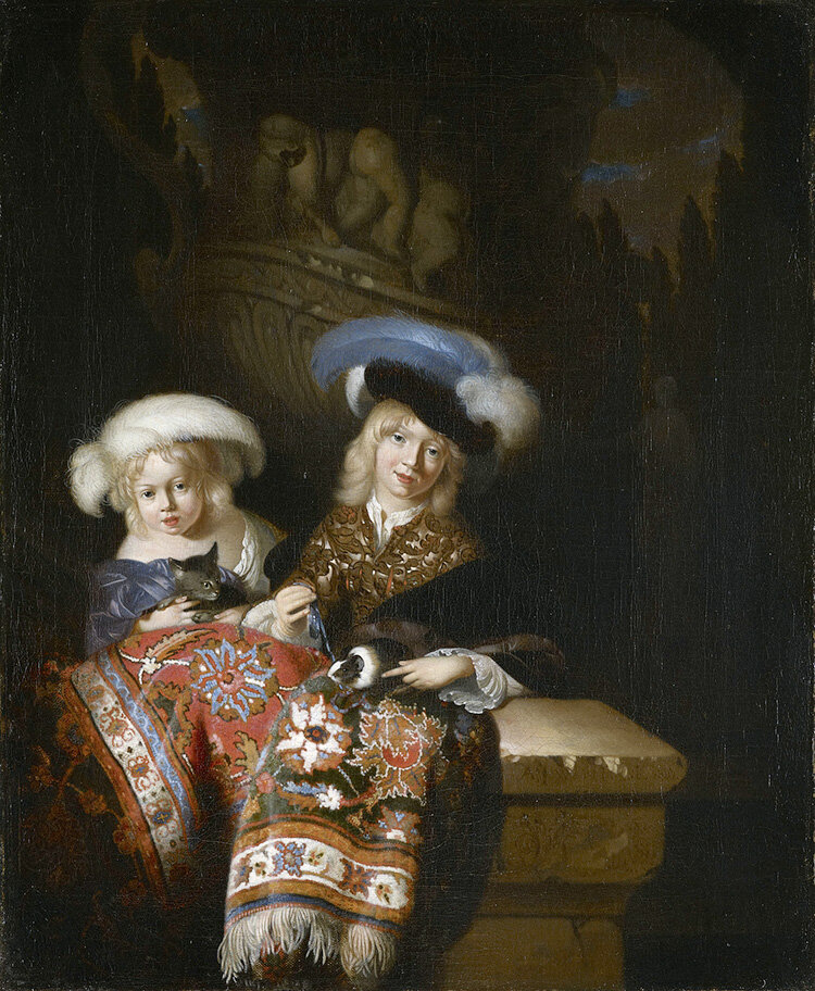 "Мальчик и девочка с морской свинкой и котенком"