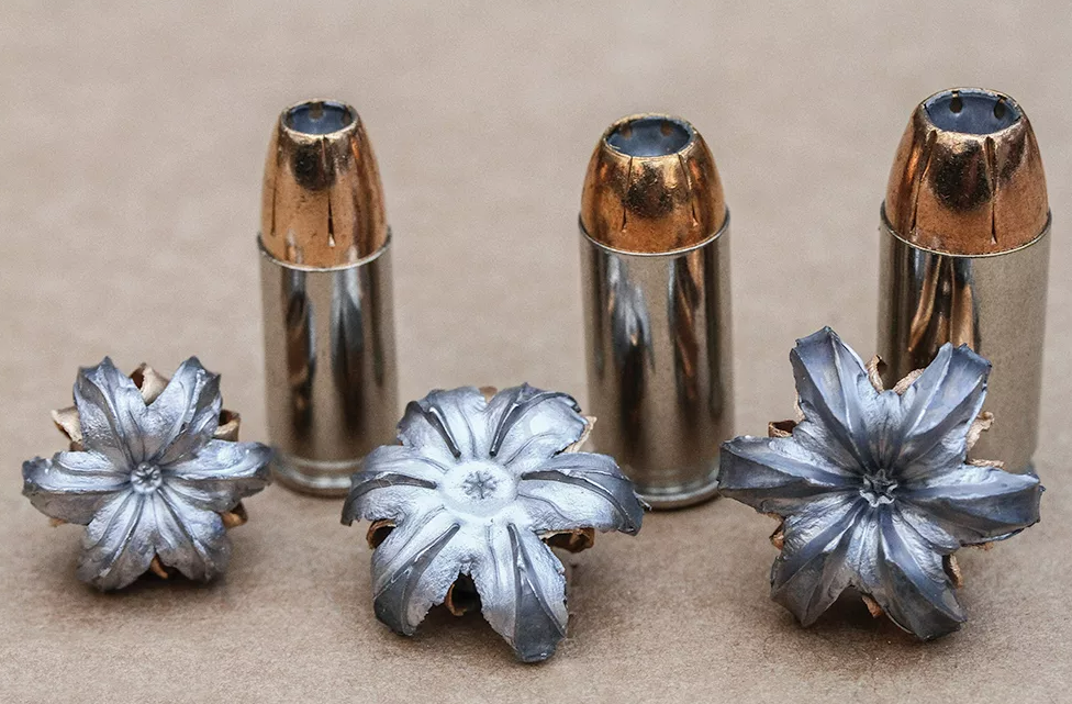 экспансивный патрон 12 калибра. пуля дум дум 12 калибра. 5 борнер. экспансивная пуля 12 калибра. цветы смерти экспансивные пули.
