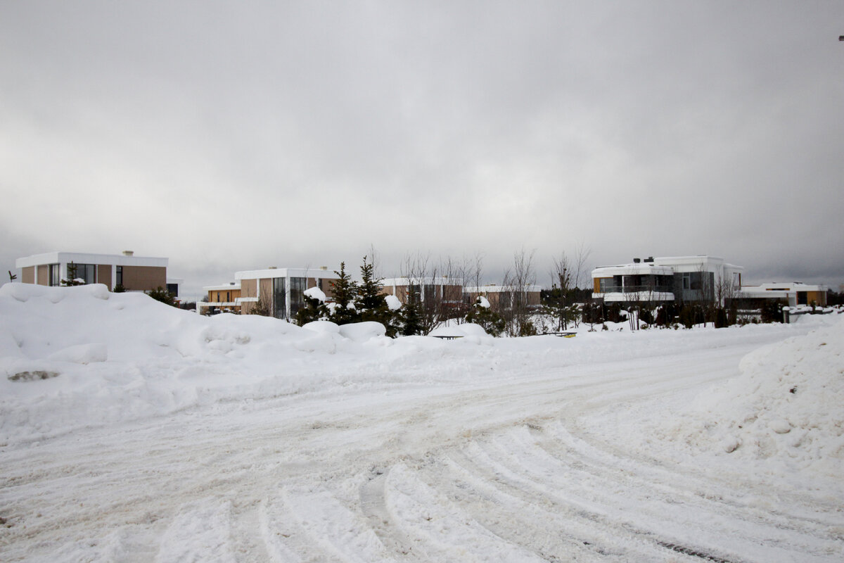 Фото архитектора Бориса Зайцева в поселке Райт Вилладж
