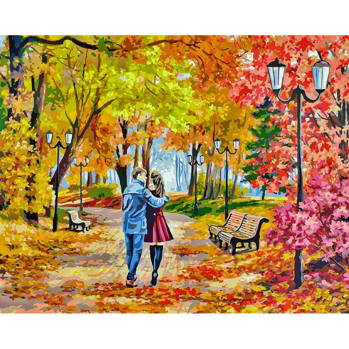 Влюбленные в прекрасном осеннем парке.