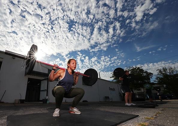    Приседания со штангойAl Bello/Getty Images