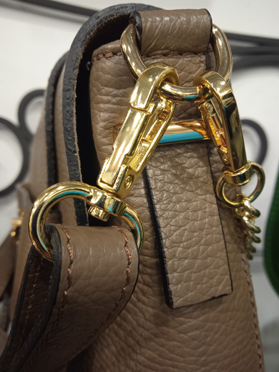 Пример использования полукольца для крепления основной ручки и вспомогательной лямки