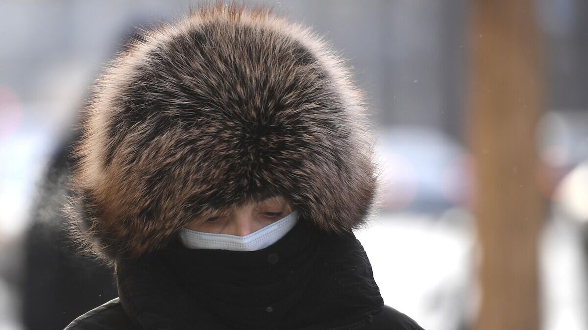    Женщина на одной из улиц в центре Москвы© РИА Новости / Владимир Астапкович