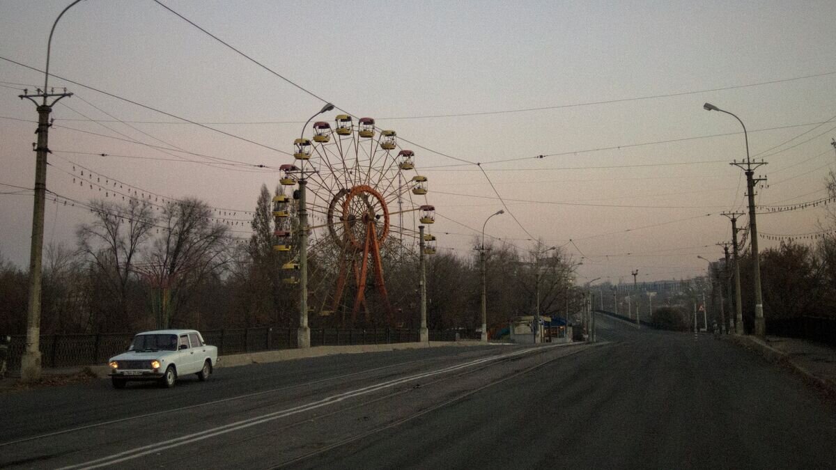    Вид на одну из улиц в Луганске© РИА Новости / Валерий Мельников