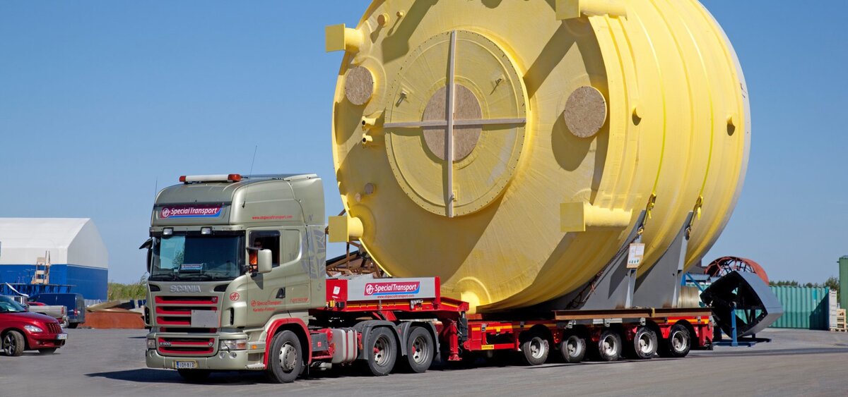 Автодоставка негабарита тралом.