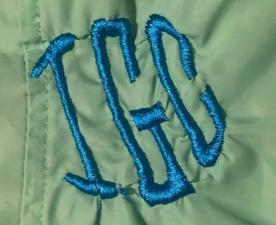 сморщивание материала вокруг вышивки