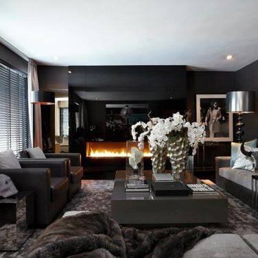 Телевизор над камином