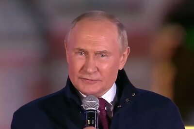    Президент РФ Владимир Путин на митинге-концерте на Красной площади ©Скриншот