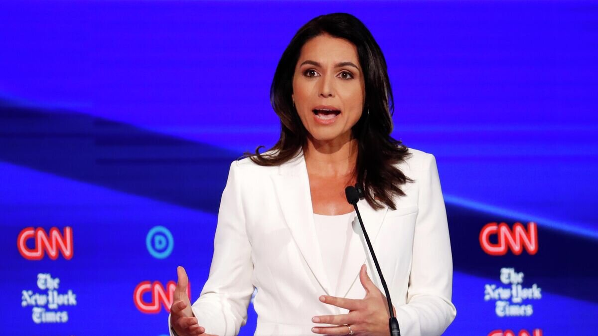    Кандидат в президенты от Демократической партии США Тулси Габбард© AP Photo / John Minchillo