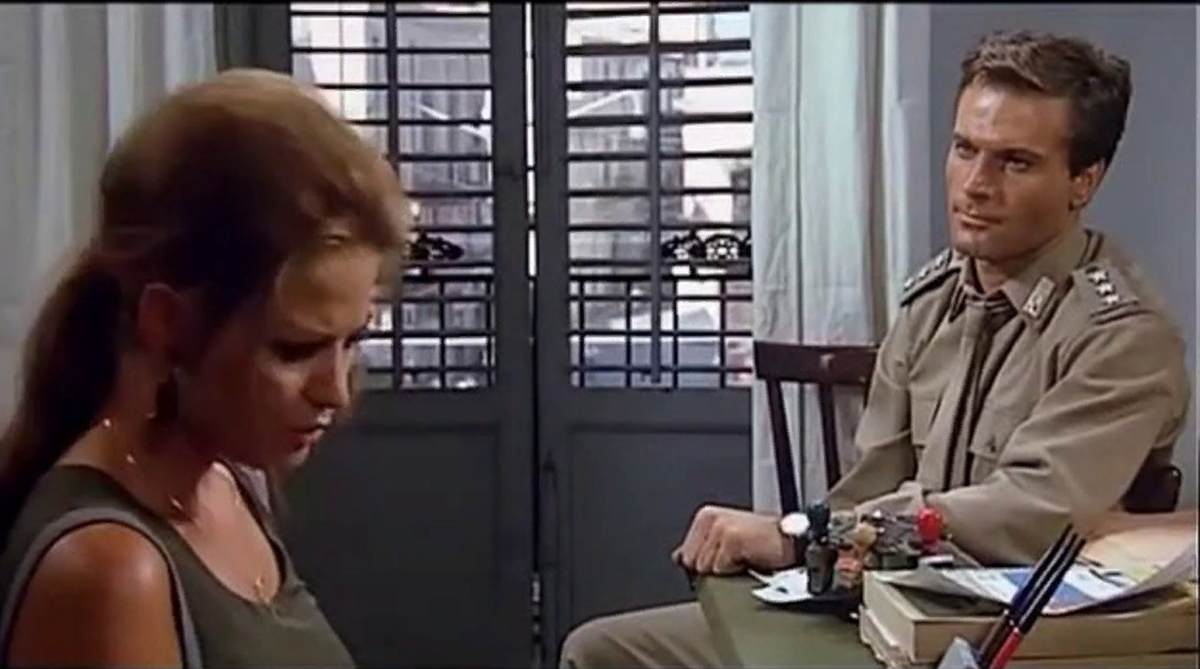 Кадр из фильма “День совы”, Клаудия Кардинале в роли Розы Николози и Франко Неро в роли капитана Беллоди