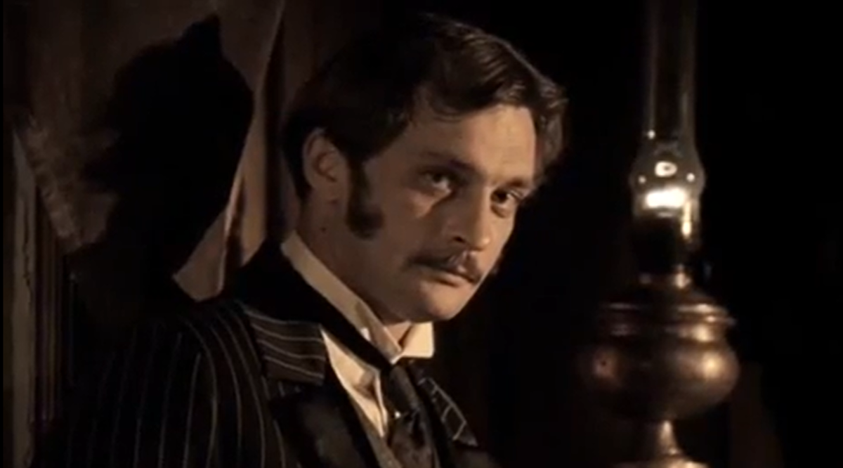 Кадр из экранизации Александр Домогаров в роли Евгения Павловича