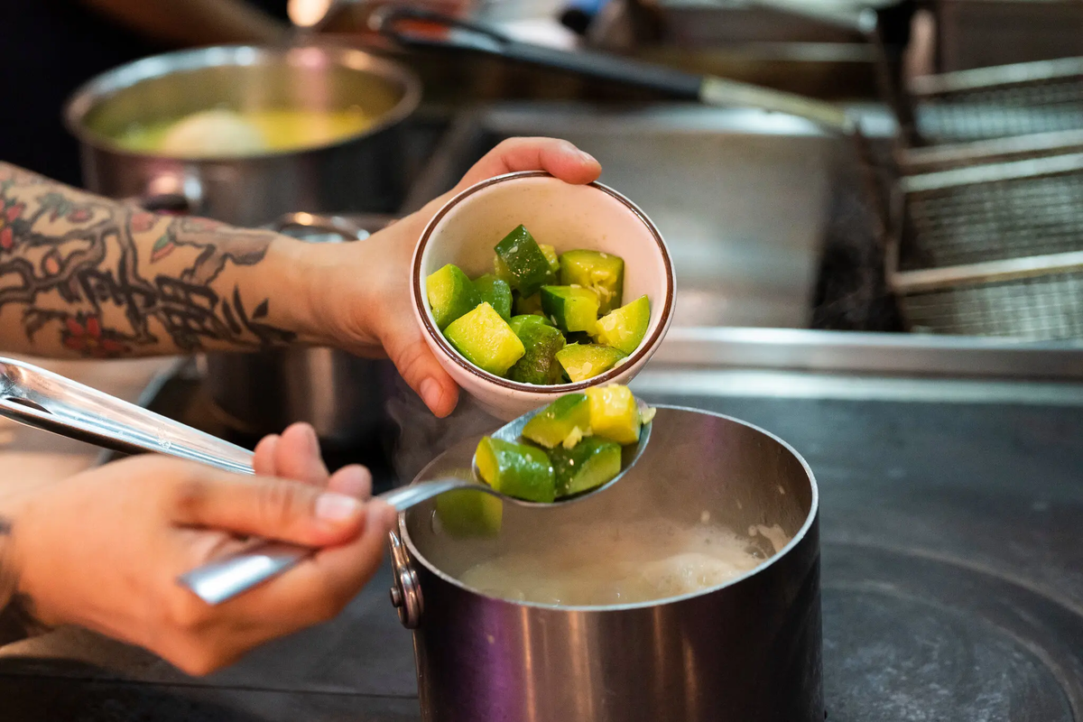 A defining component of Mrs. Hong’s dish is her “Korean mirepoix”: potatoes and hobak, a sweet Korean squash, cooked slowly in chicken fat until translucent.
