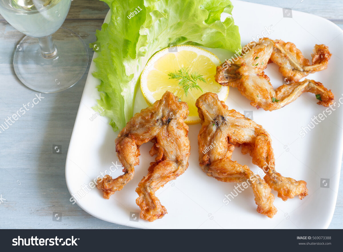 Ссылка: https://www.shutterstock.com/ru/image-photo/fried-frog-legs-on-plate-food-569073388