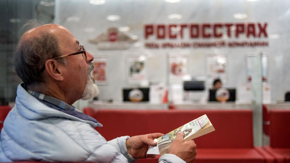    В офисе страховой компании "Росгосстрах"© РИА Новости / Григорий Сысоев