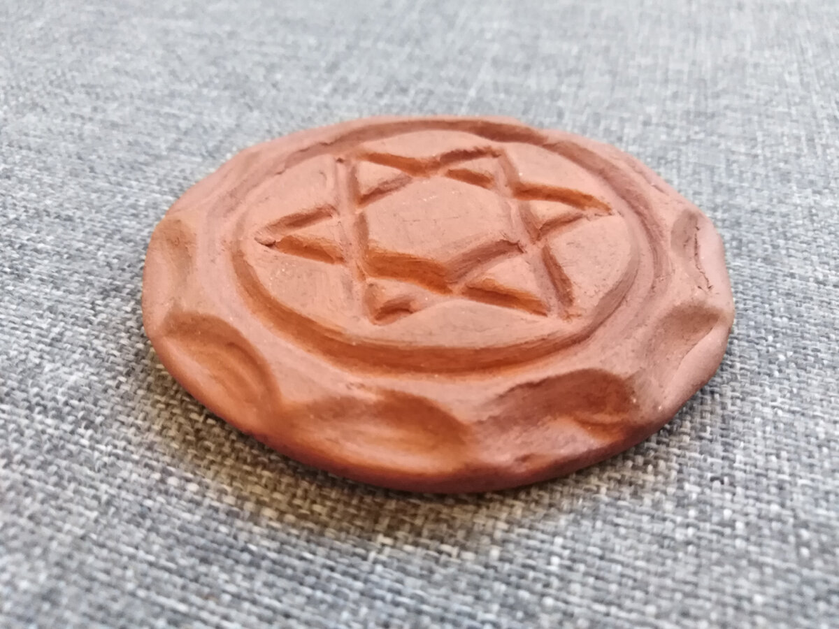 Амулет из глины