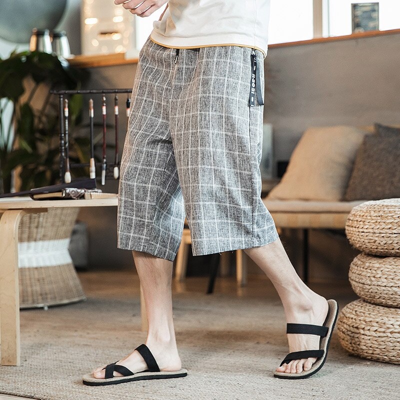 Широкие брюки в клетку мужские