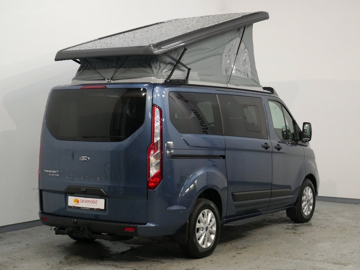 Снаружи фургон отличается от обычных подъемной крышей со спальными местами