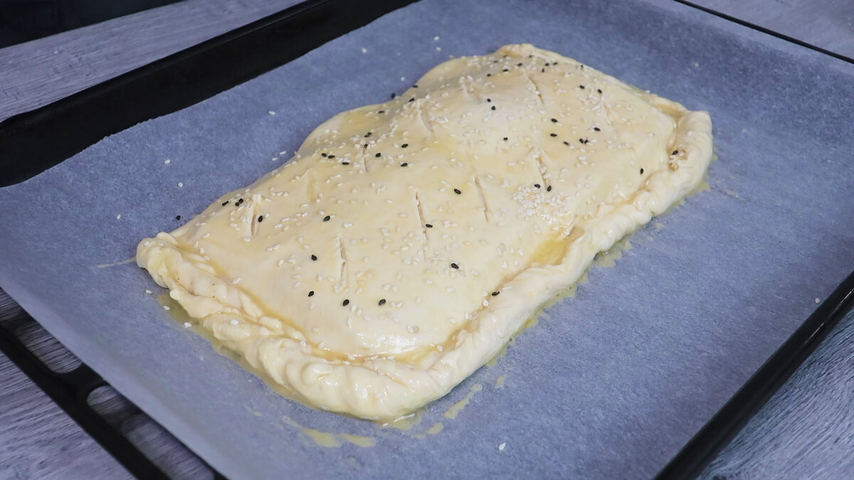 Слоеный пирог ветчина с сыром слоеное тесто рецепт с фото пошагово