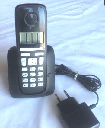 Абонентская трубка с зарядным устройством