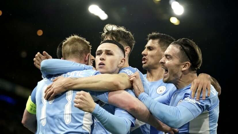     Футболисты «Манчестер Сити» в матче с «Атлетико» в 1/4 финала Лиги чемпионов AP Dave Thompson