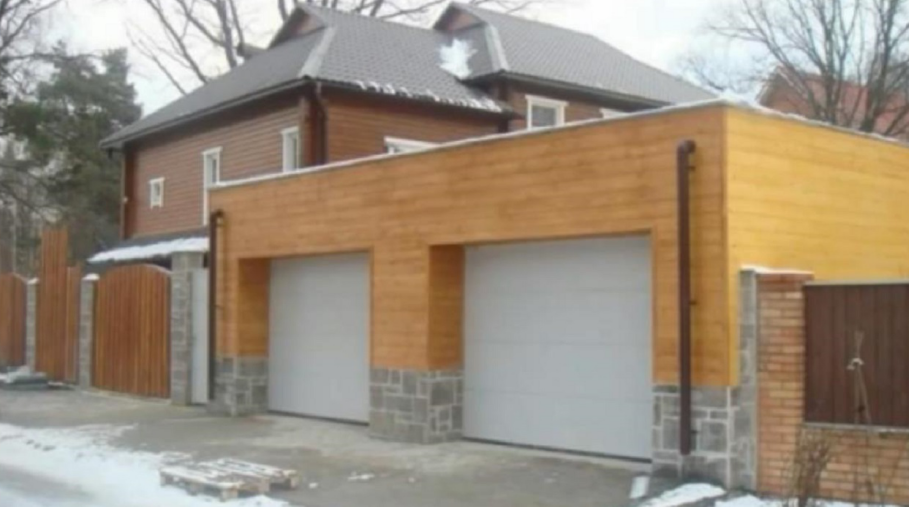 Гараж на загородном участке. Гараж на ижс. Гараж на ижс. Дом с гаражом. Гараж на ижс.