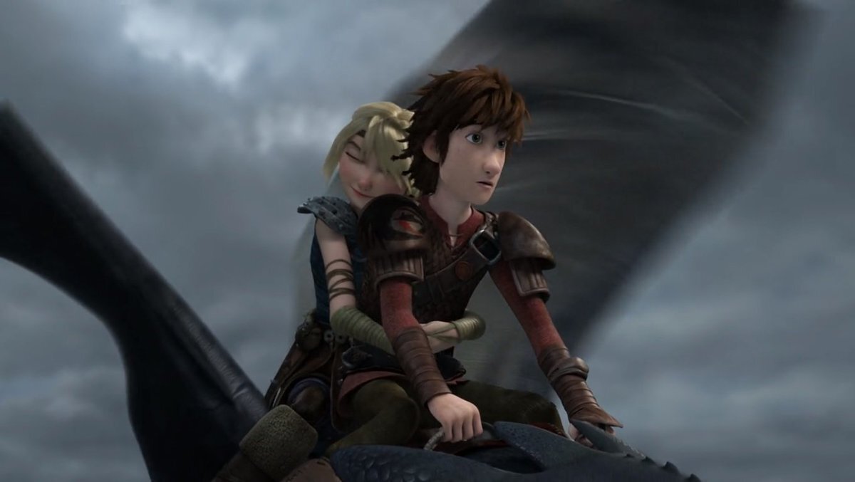 Иккинг спасает Астрид на Беззубике (кадр из мультфильма, подходящий для данного момента по фанфику "Холод и Молния").