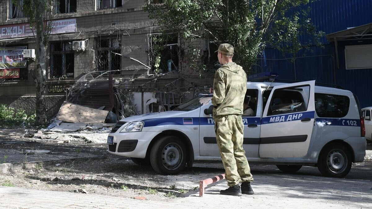    Сотрудники МВД ДНР© РИА Новости / Константин Михальчевский