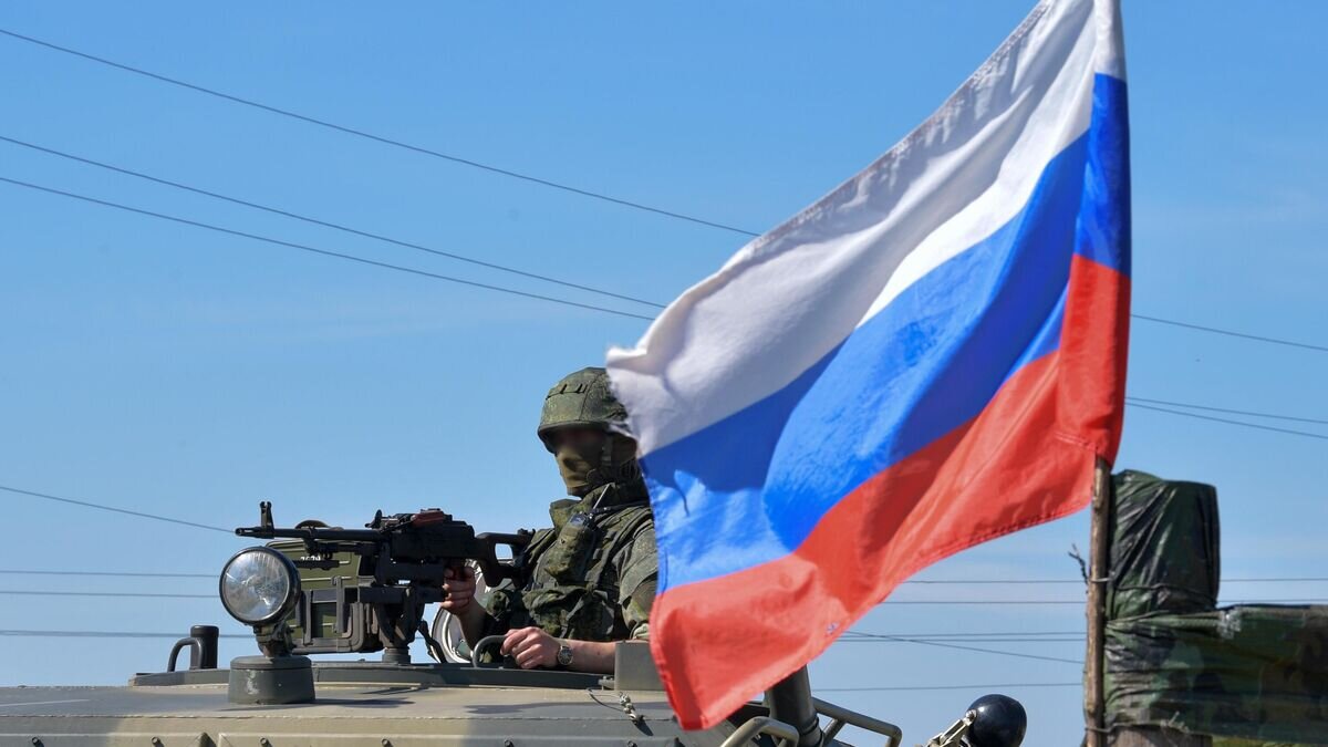    Российский военнослужащий на блокпосту на въезде в населенный пункт в Харьковской области в зоне проведения специальной военной операции© РИА Новости / Кирилл Нортон