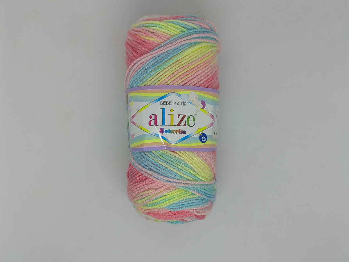 Радужная и яркая нить - как раз для кукол