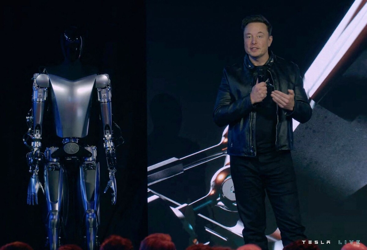 Elon und Optimus: Der Techmilliardär präsentierte einen Roboter, der das Leben der Menschheit revolutionieren soll Foto: Tesla / Handout / AFP