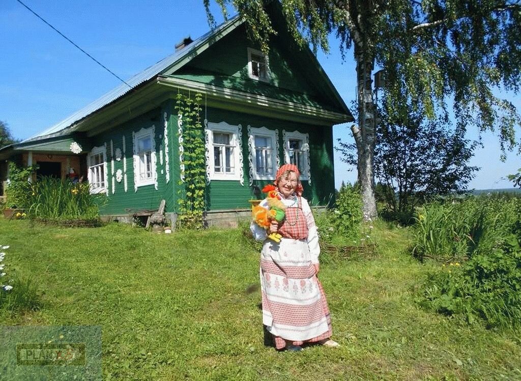 С какой целью приехал фотограф в деревню в рассказе фотография