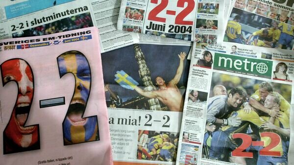    Зарубежная пресса после встречи шведов и датчан на ЕВРО-2004© AFP 2022 / TOBIAS ROSTLUND