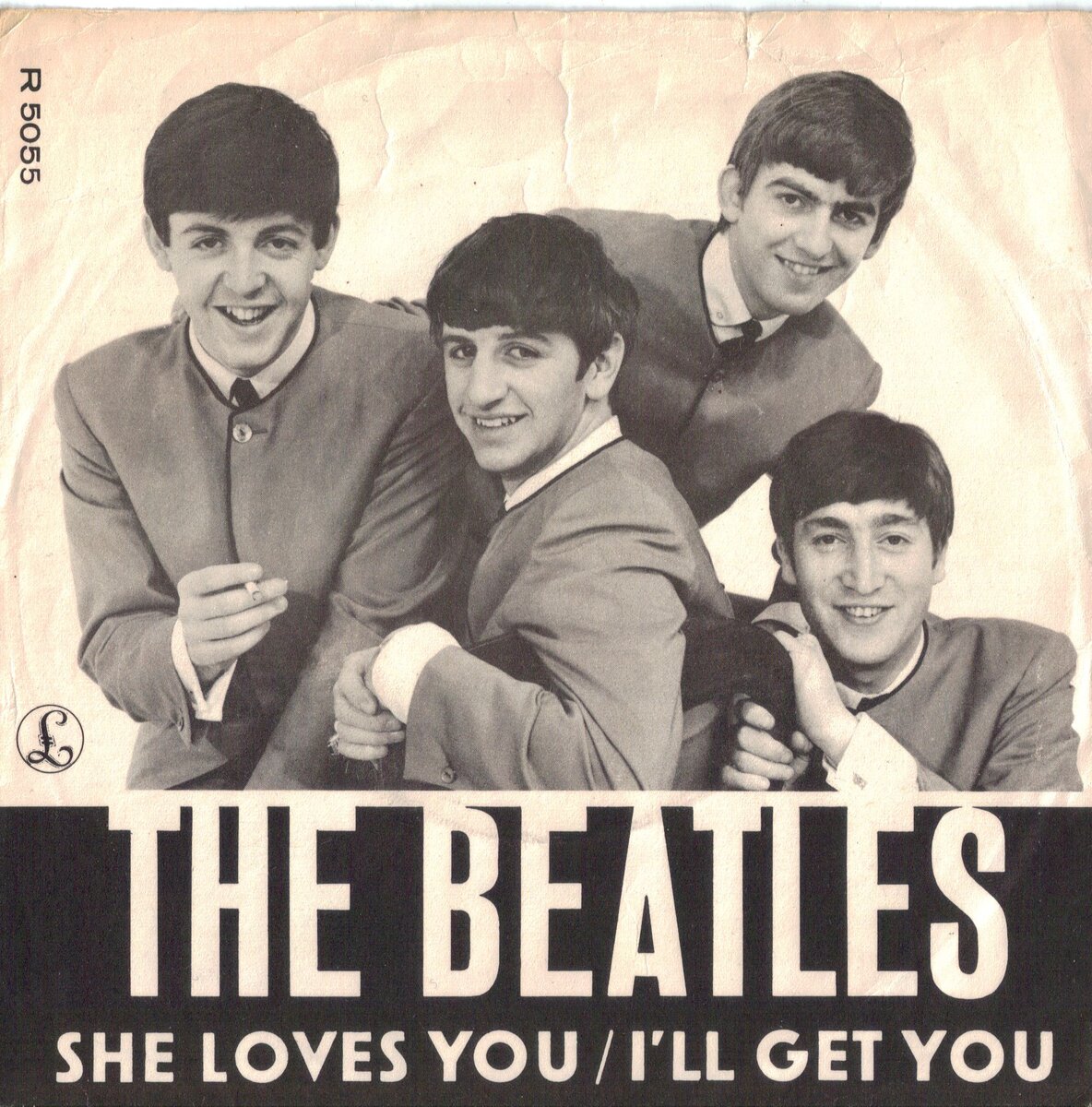 Конверт сингла "She Loves You" британской группы The Beatles