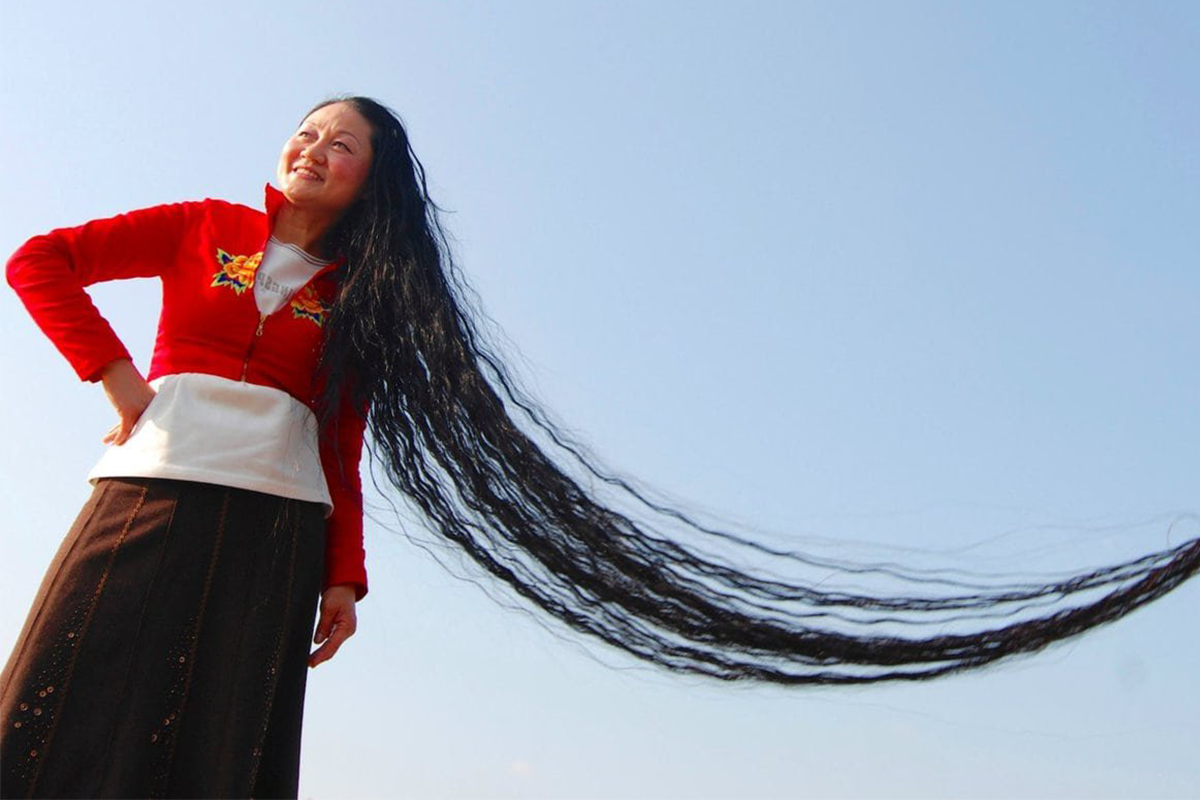 Самый высокий волос. Ксие Квипингт из Китая. Се Цюпин. Самые длинные волосы в мире Ксие Квипингт. Аша Мандела черная Рапунцель.