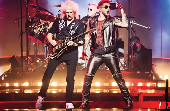 С 2012 года легендарная рок-группа Queen гастролирует с победителем конкурса «American Idol» Адамом Ламбертом, их туры получают восторженные отзывы и становятся все более масштабными.-2