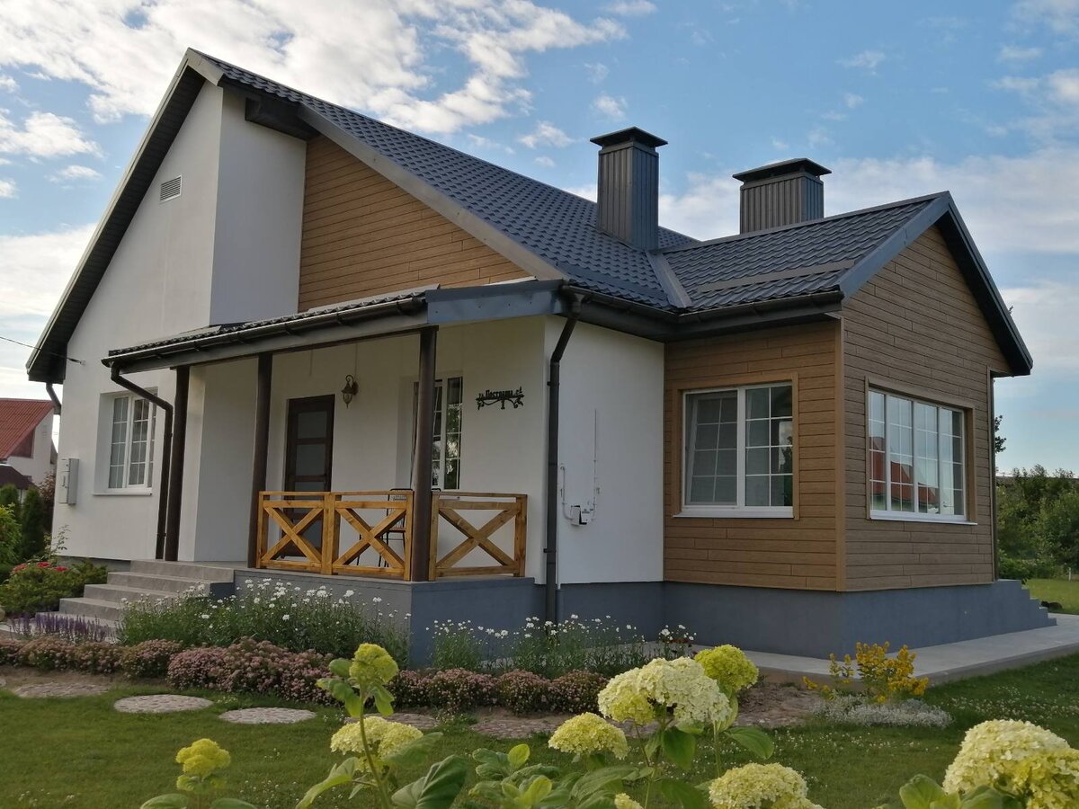 На фото сайдинг нового поколения коллекция Hokla лиственница медовая