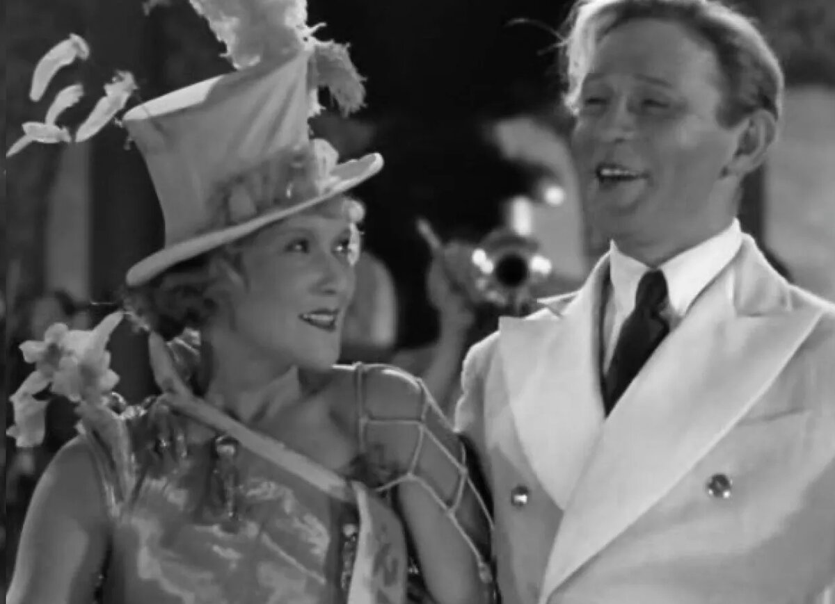 Любовь Орлова и Леонид Утесов в фильме "Веселые ребята" (1934), реж. Г. Александров. 