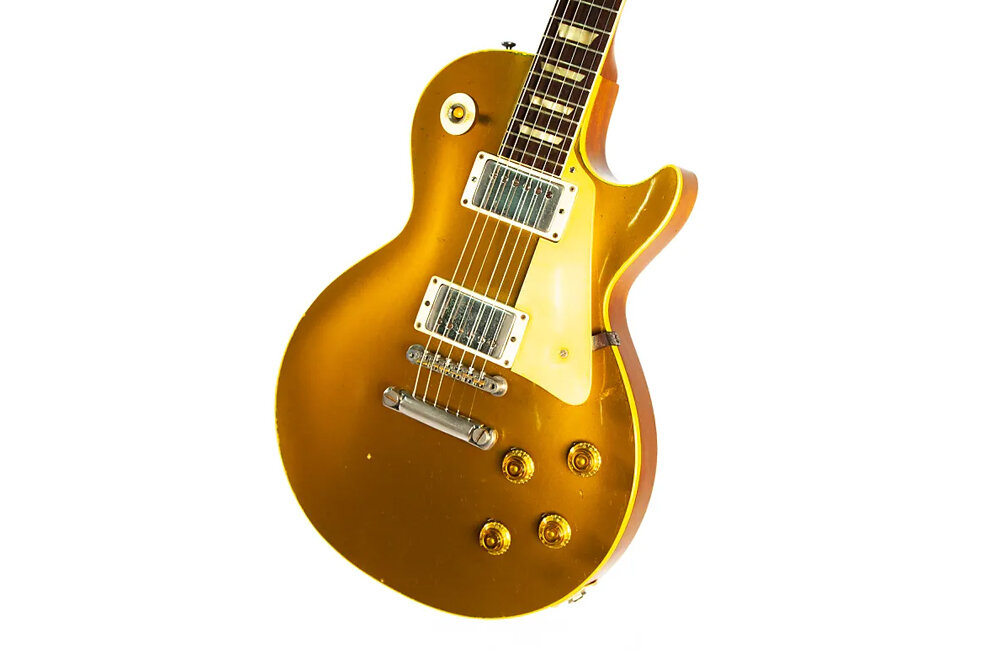 Редкая гитара Gibson Les Paul Gold Top 1958 года. Это один из фаворитов Армстронга для игры на концертах.