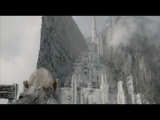 Готмог уворачивается от "снаряда", выпущенного со стен Минас Тирит.