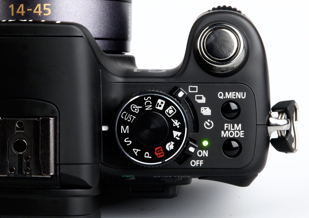 фото: https://www.ephotozine.com/articles/Panasonic-Lumix-G1-10577/images/panasonic_g1_mode_dial.jpg